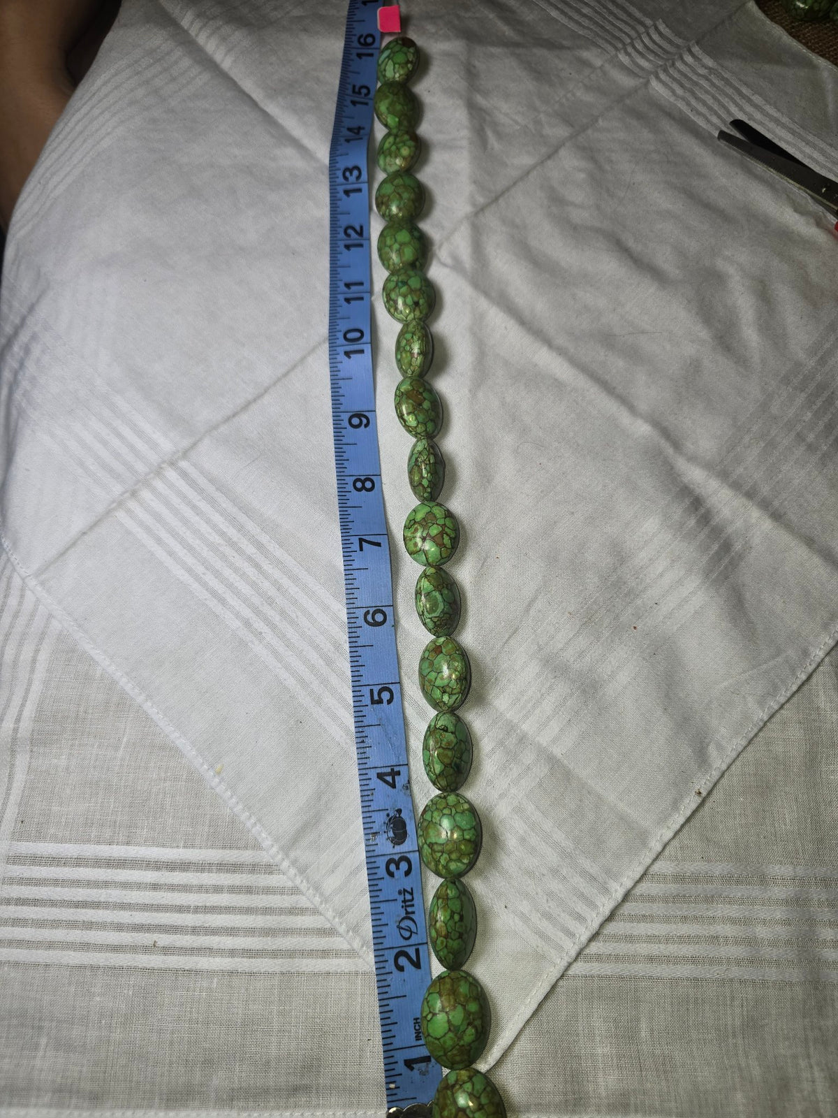 Green Picasso Jasper oval bead strand with ruler