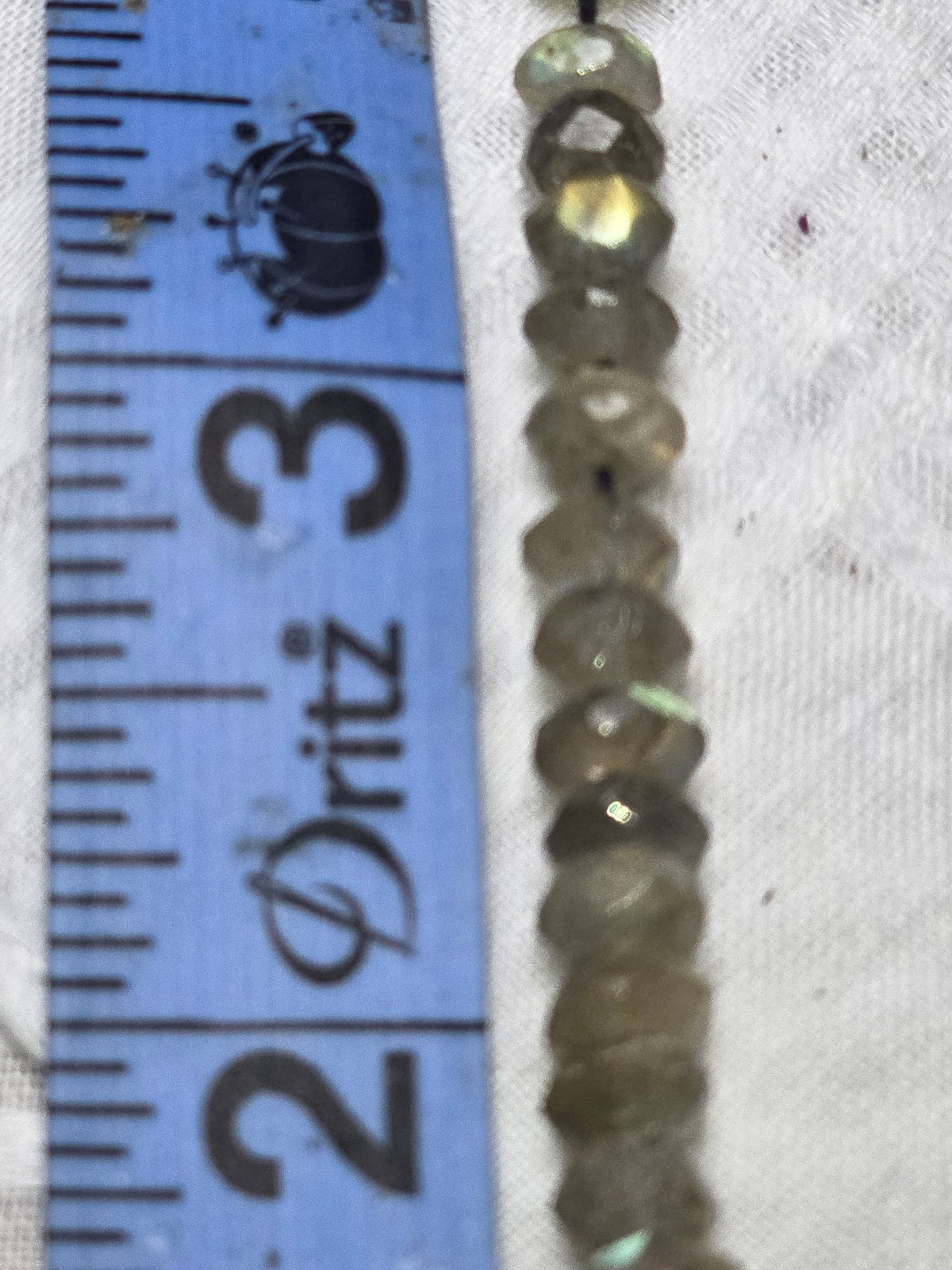 Labradorite faceted rondelle beads closeup