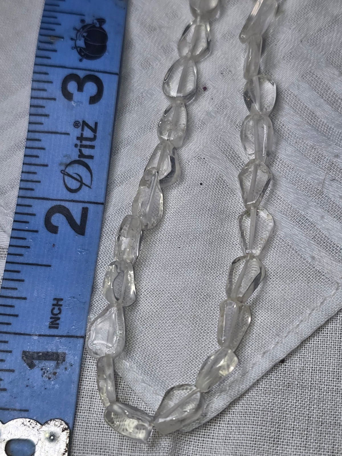 Clear quartz teardrop beads closeup