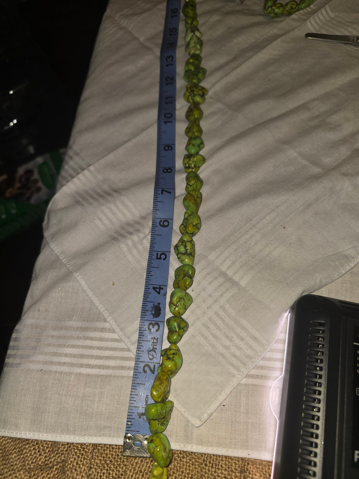 Green howlite nugget bead strand with ruler