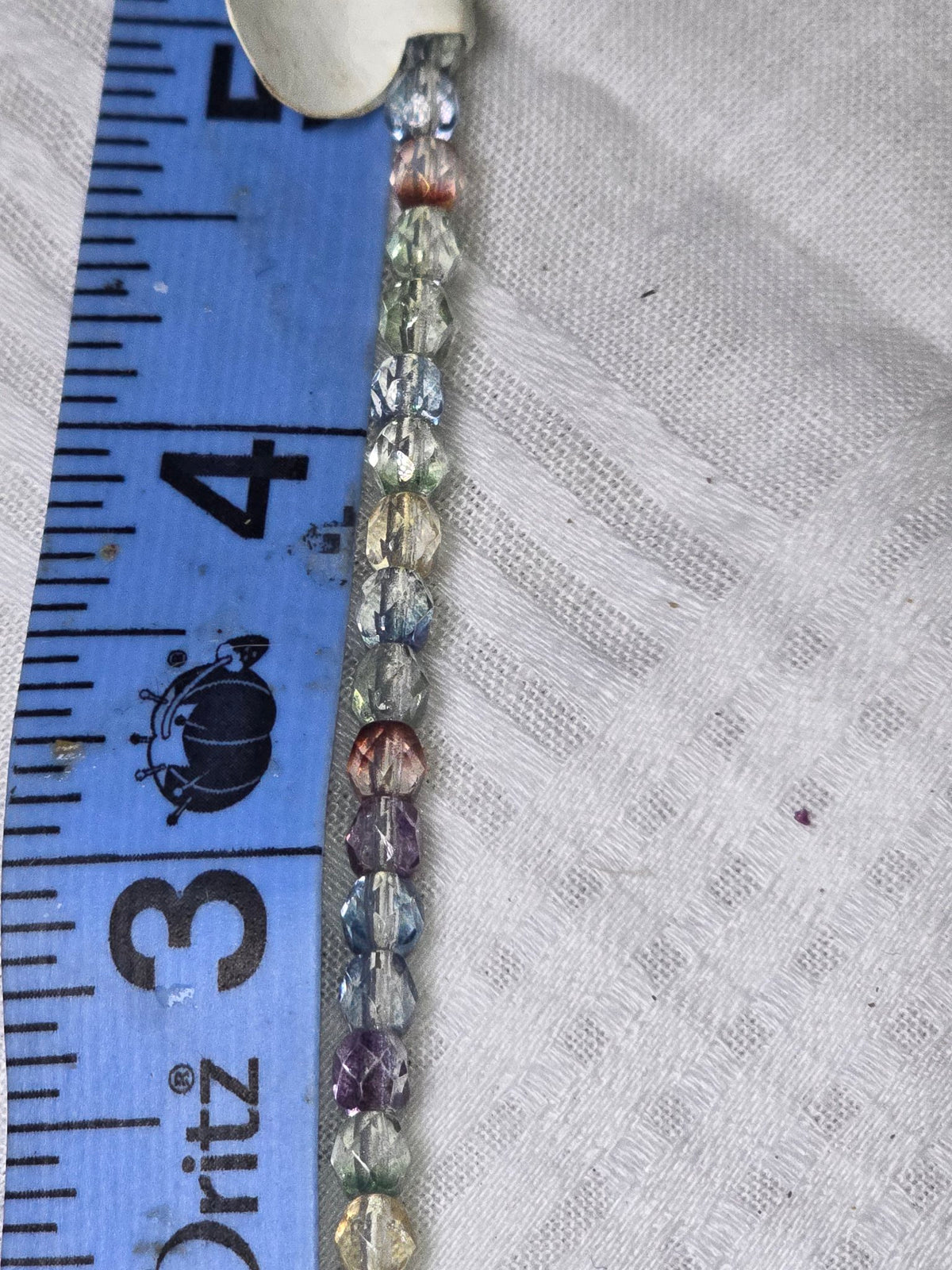 Mixed pastel crystal faceted beads closeup