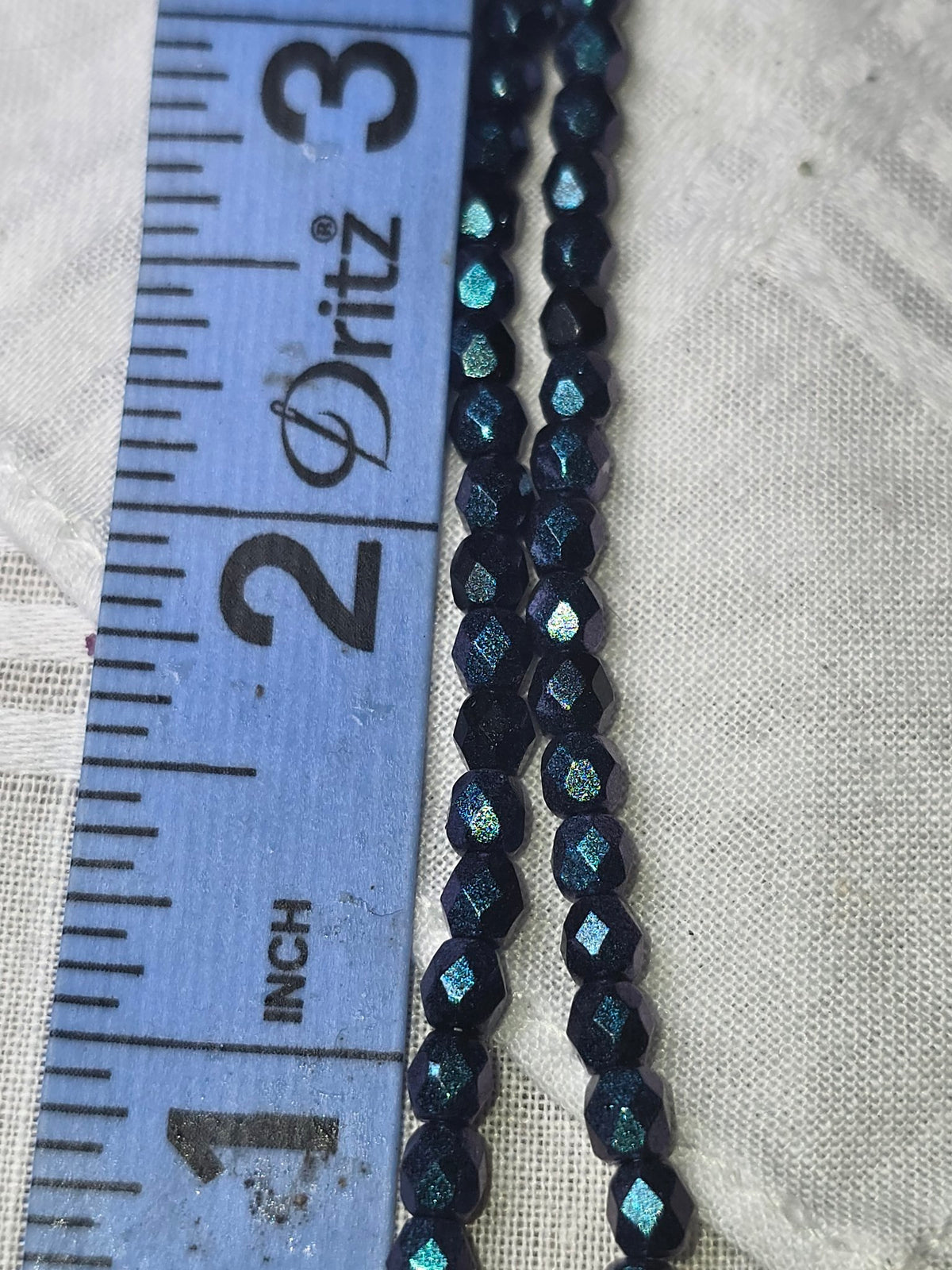 Dark blue crystal faceted beads closeup