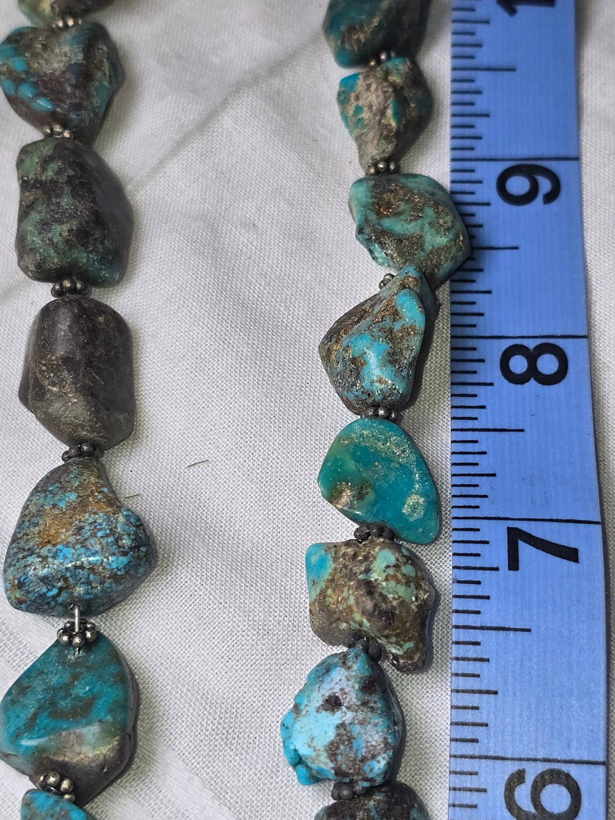 Chunky turquoise nugget bead strand closeup