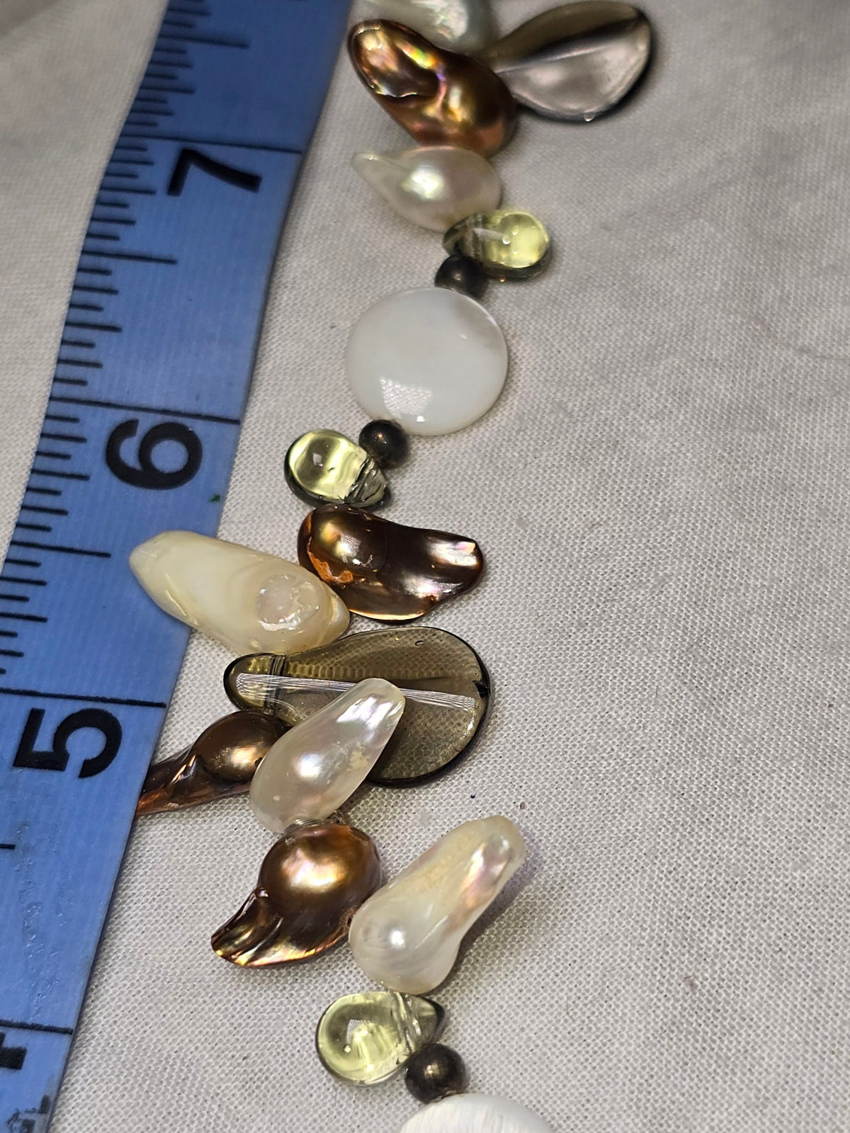 Mixed real pearl bead strand closeup