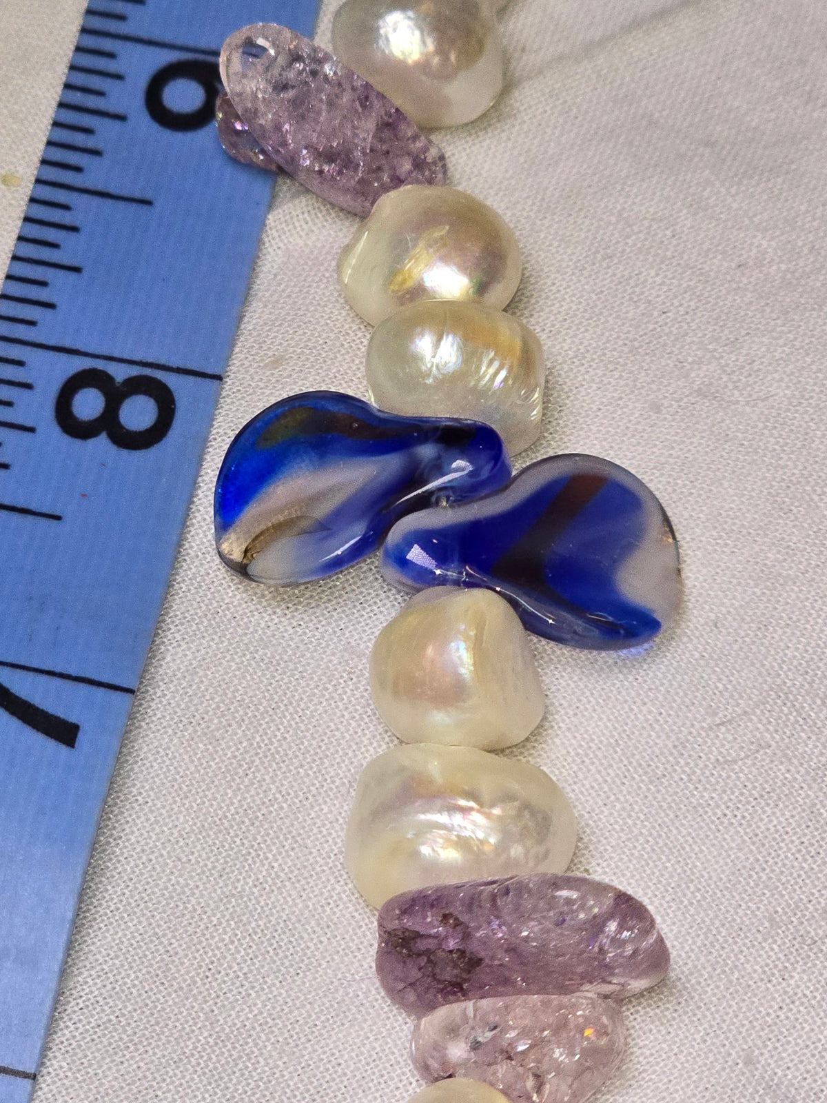 Mixed pearl glass crystal bead strand closeup