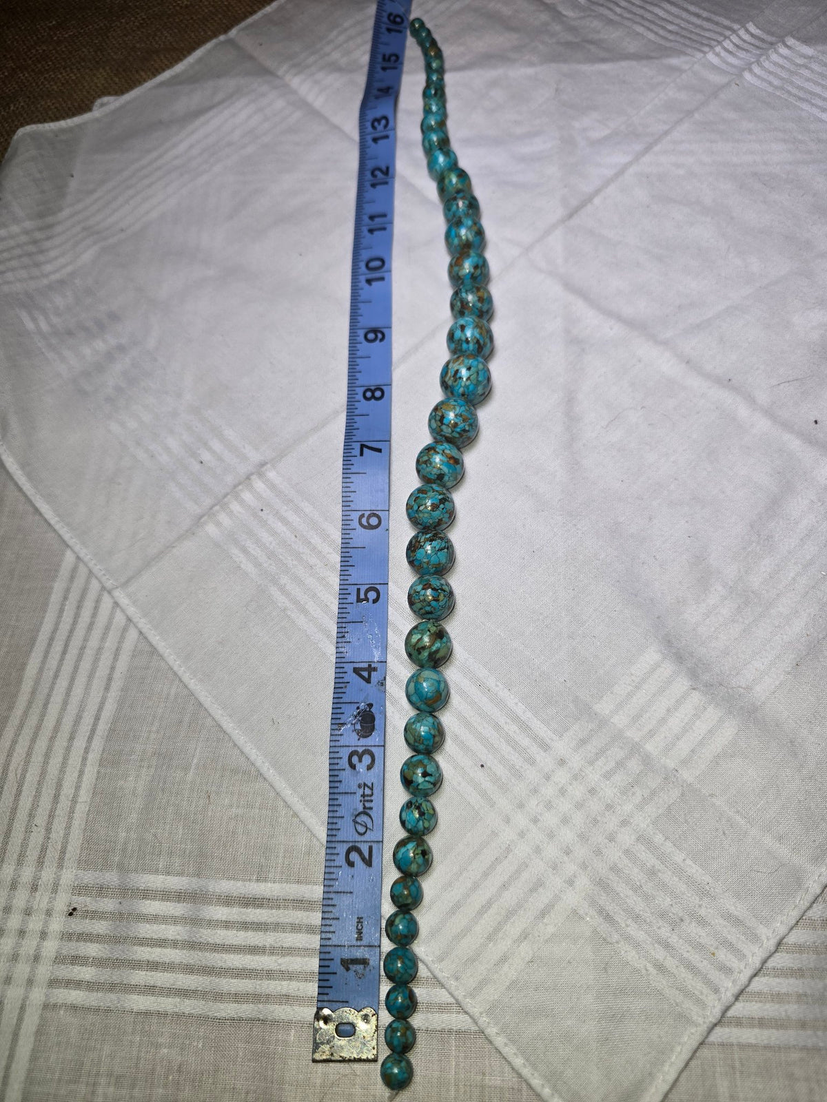 Turquoise round bead strand