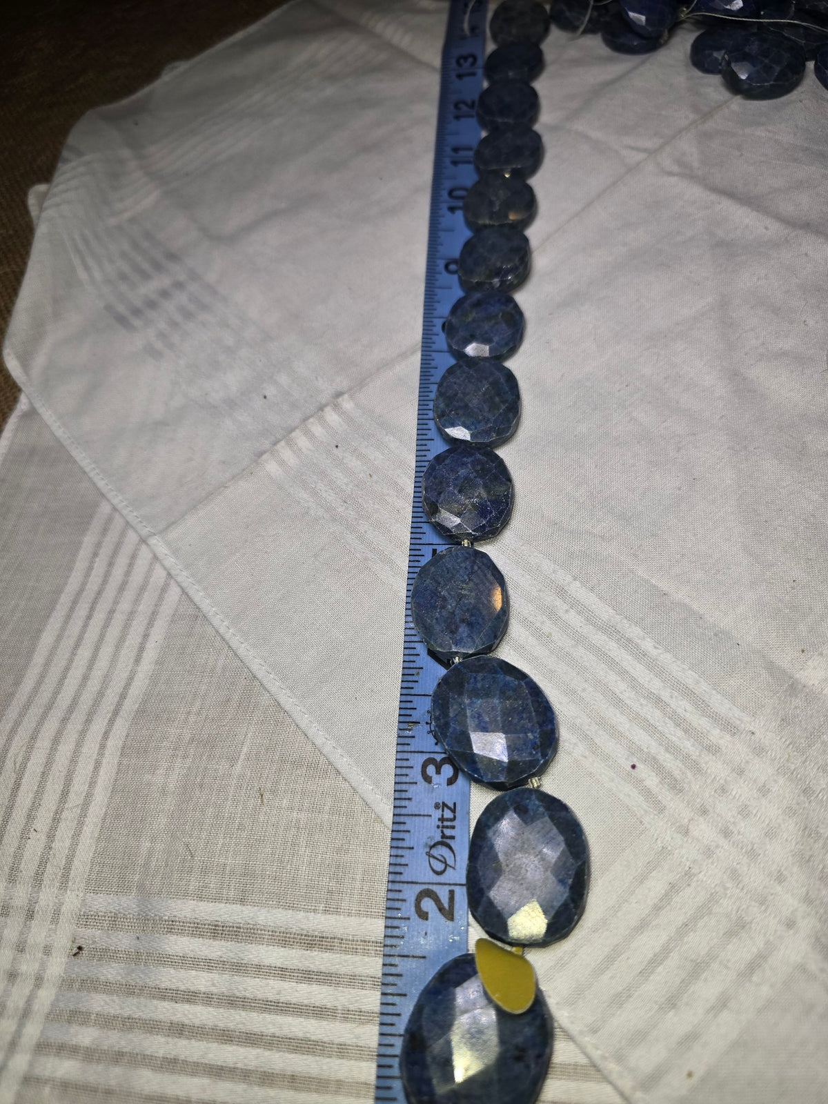 Lapis faceted oval bead strand full view
