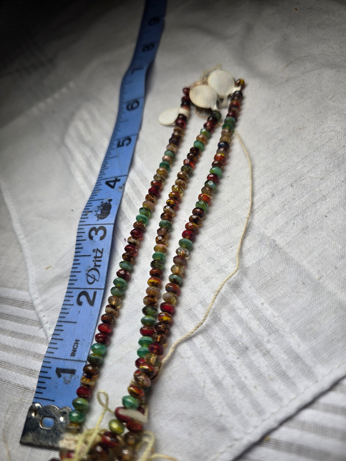 Multicolor faceted rondelle bead strand second view
