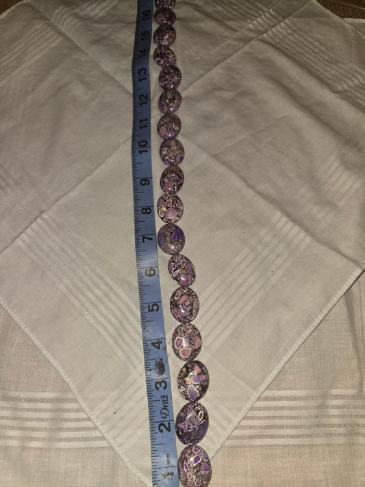 Picasso Jasper oval bead strand, purple mosaic, 17 beads, 16 inches, with ruler for scale