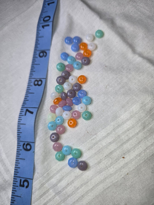 Mixed pastel glass rondelle beads with ruler