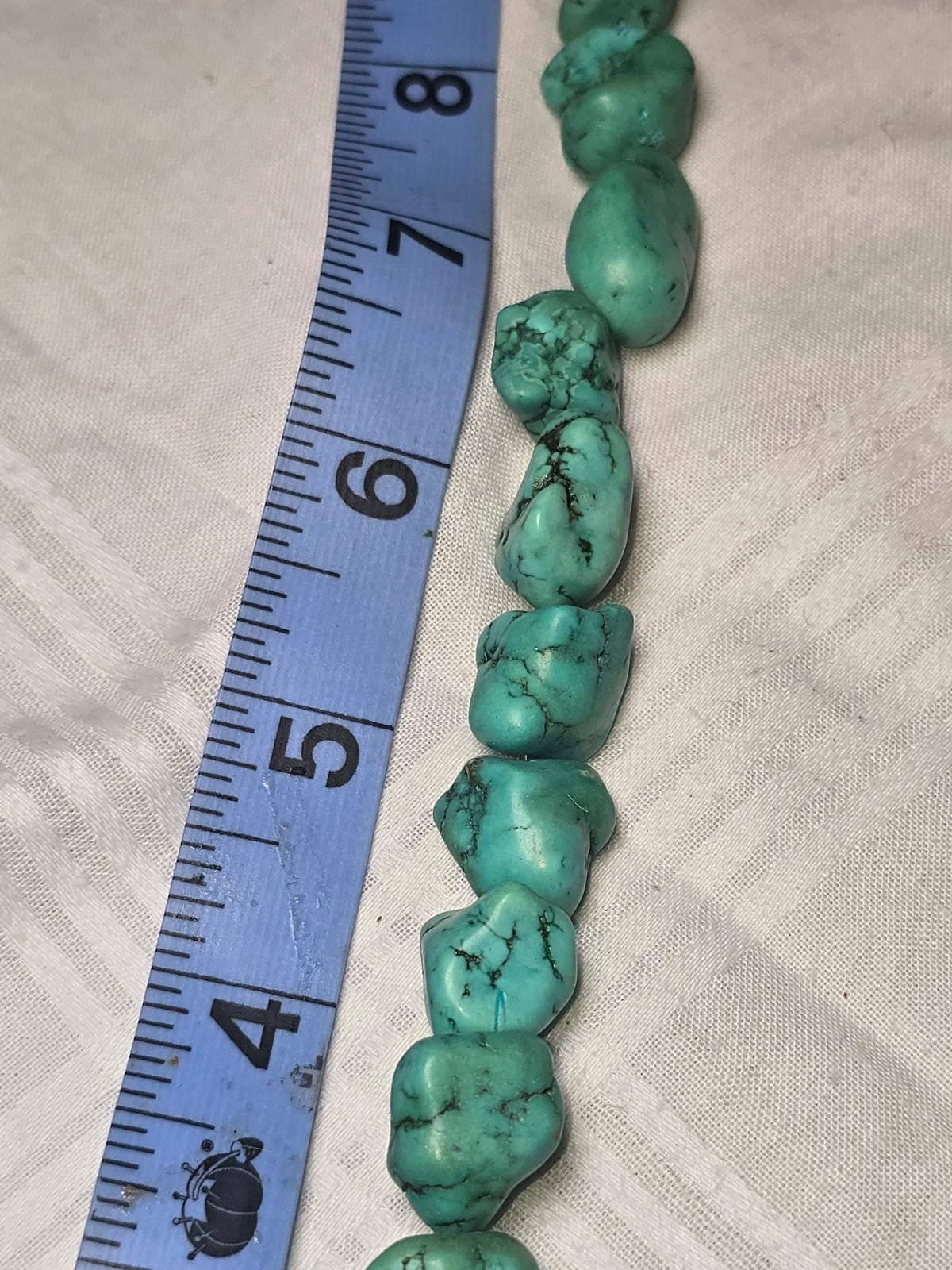 Closeup of howlite nugget beads