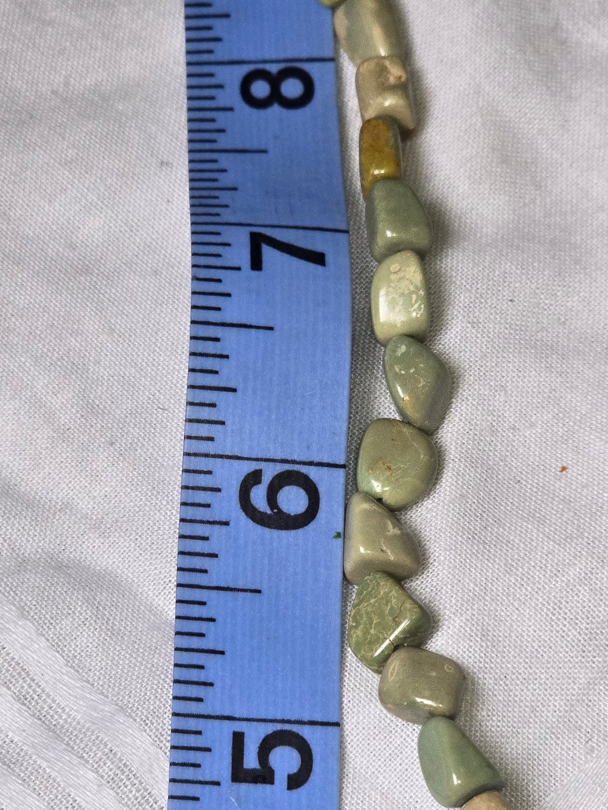 Green turquoise nugget beads closeup