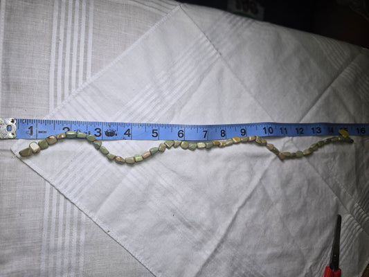 Green turquoise nugget bead strand with ruler