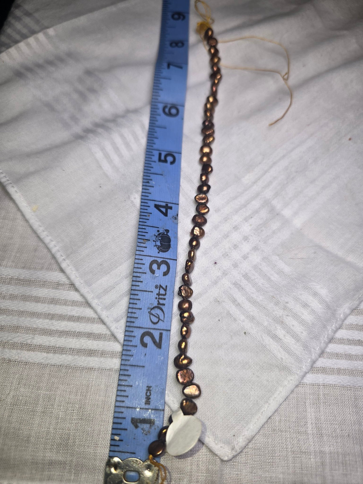 Bronze freshwater pearl bead strand with ruler