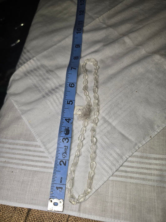 Clear quartz teardrop bead strand with ruler