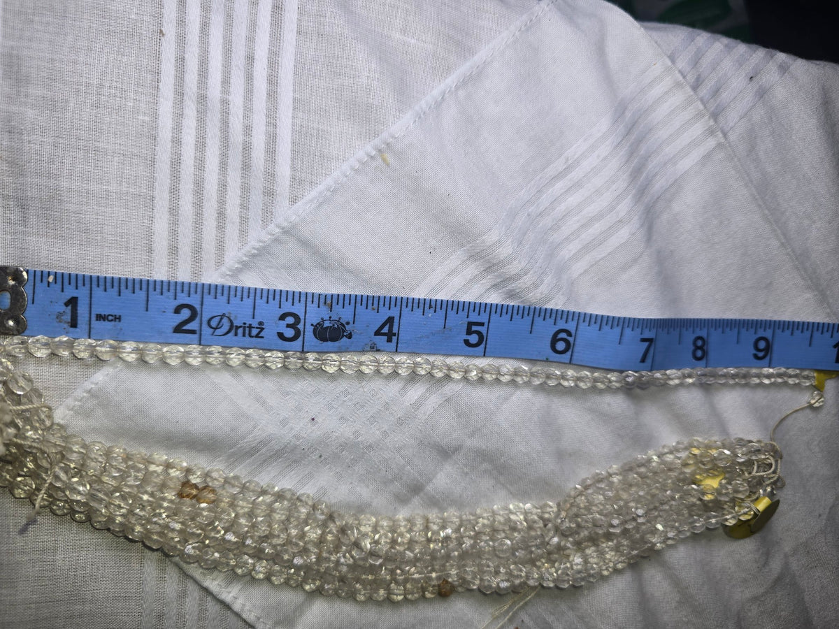 Clear quartz faceted round bead strand with ruler