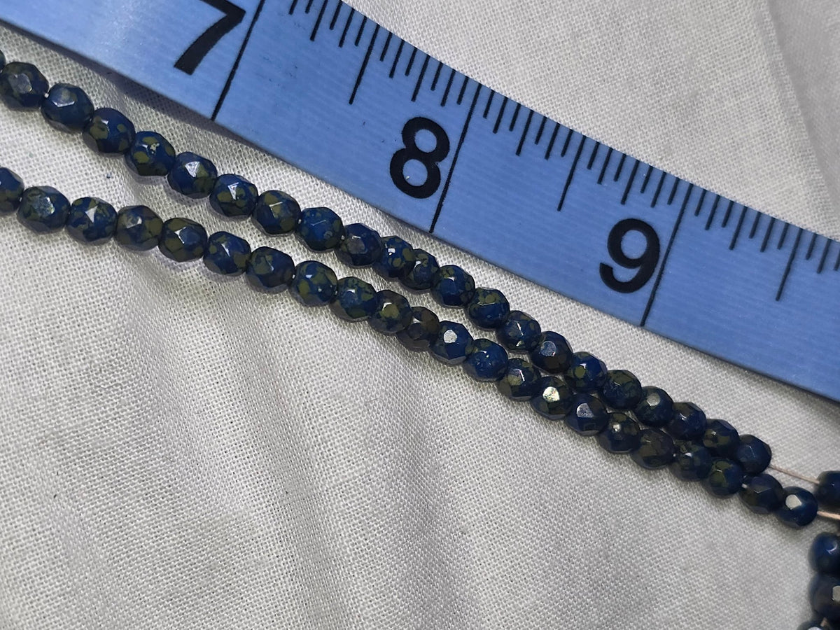 Azurite malachite faceted round beads closeup