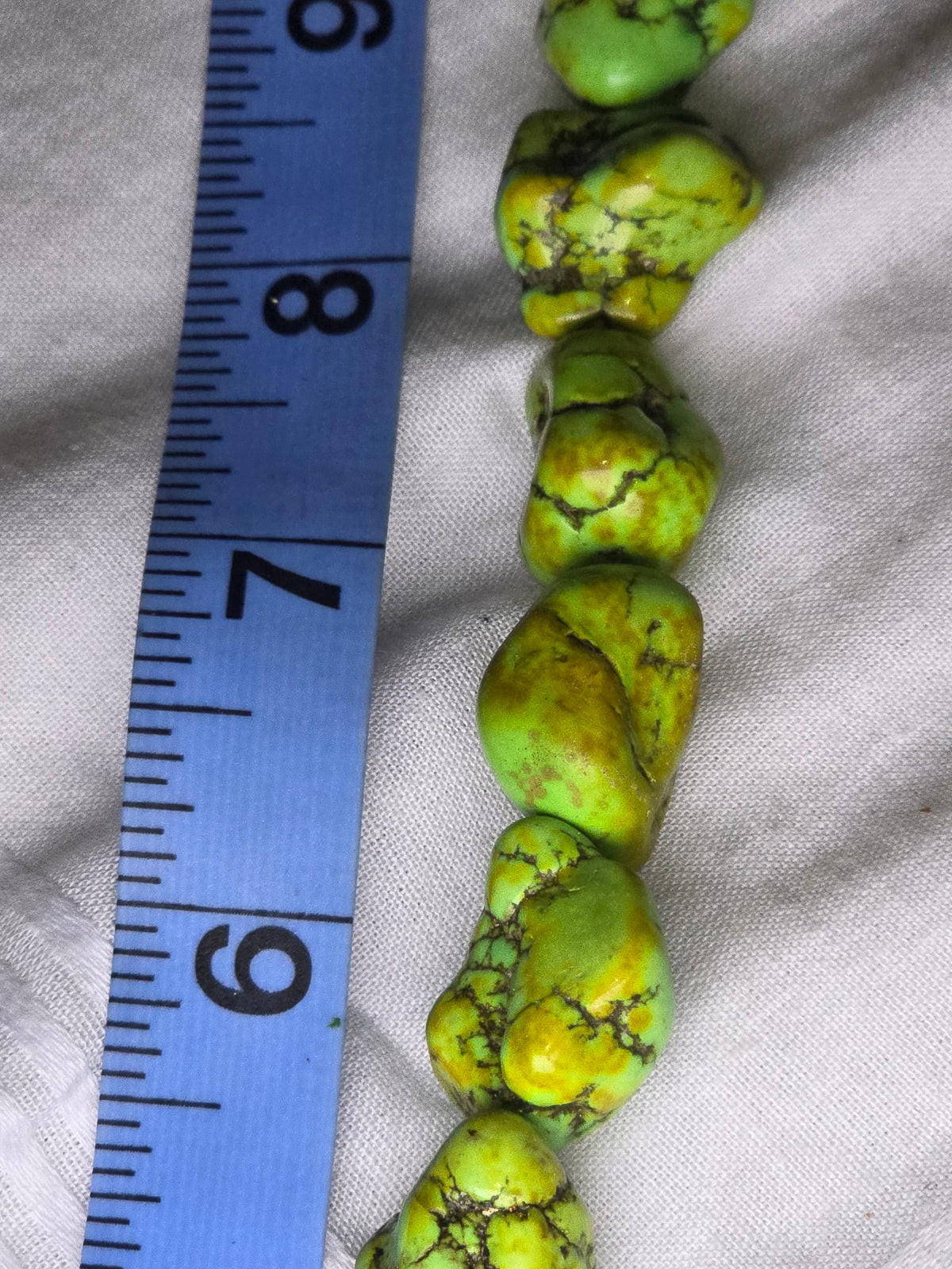 Green howlite nugget beads closeup