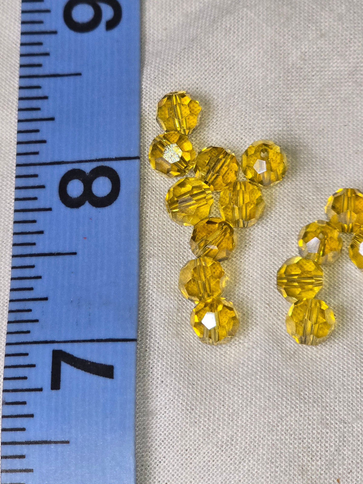 Golden crystal faceted beads closeup
