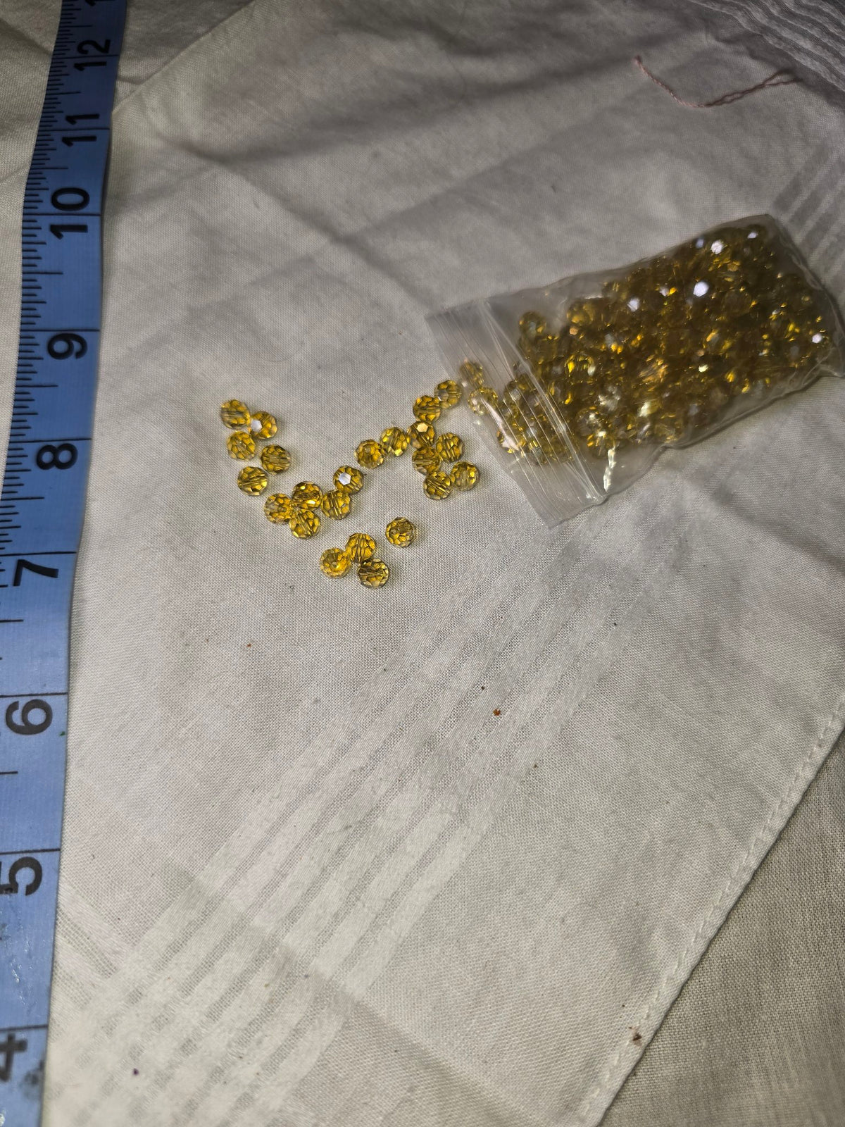 Golden crystal faceted round beads loose in bag