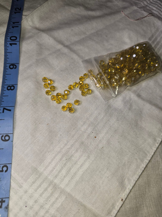 Golden crystal faceted round beads loose in bag