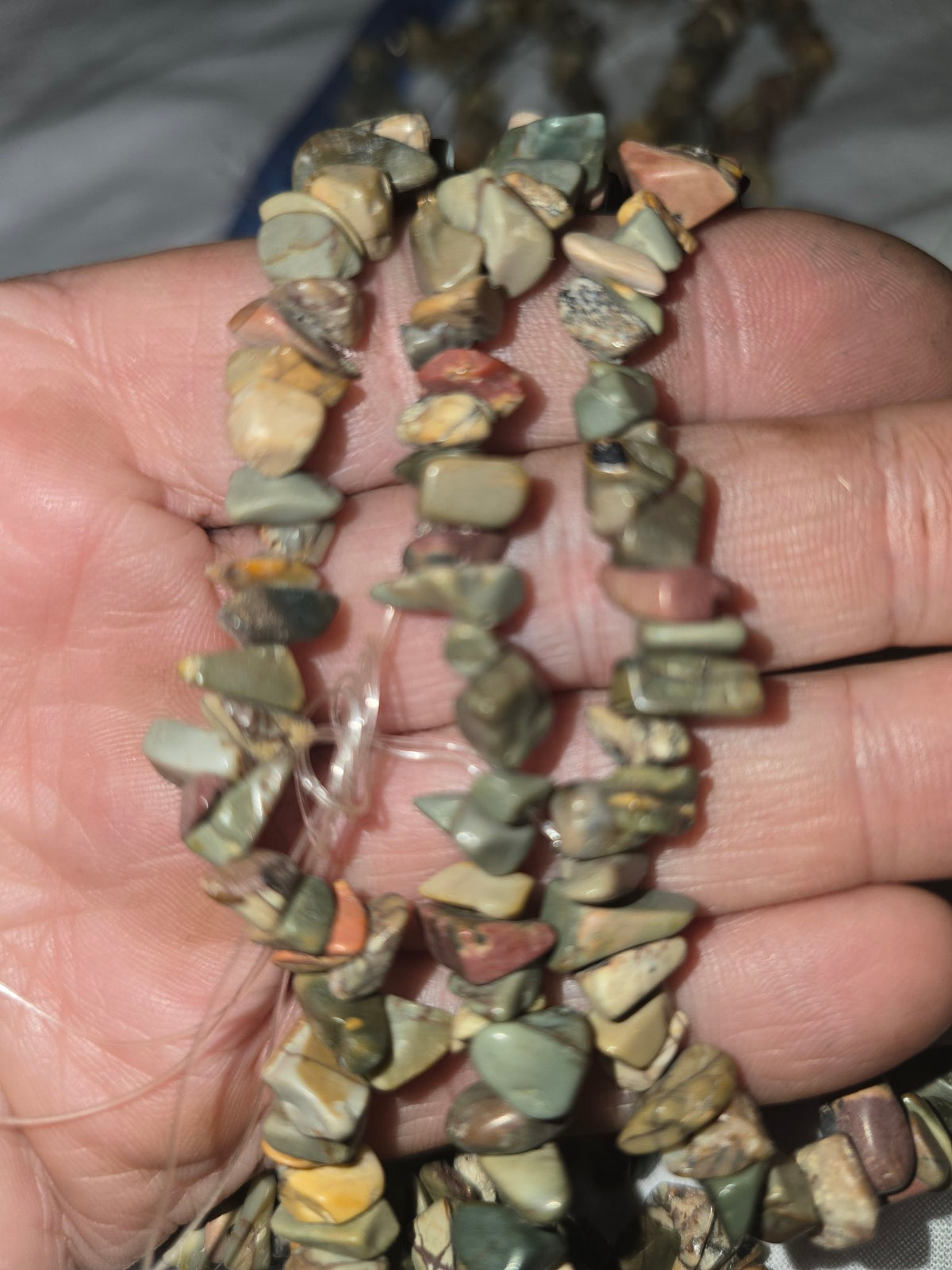 Jasper chip beads in hand