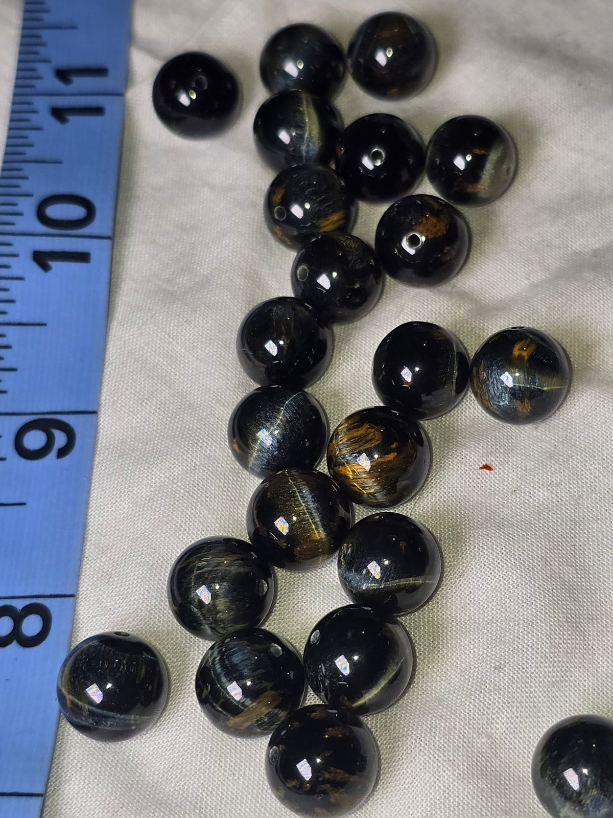 Blue tiger eye round beads lot second angle