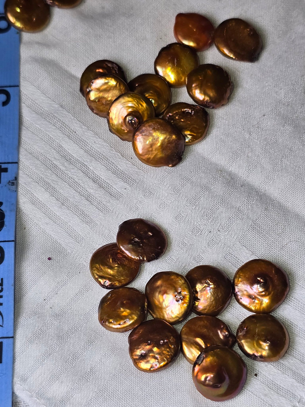 Bronze freshwater coin pearls closeup