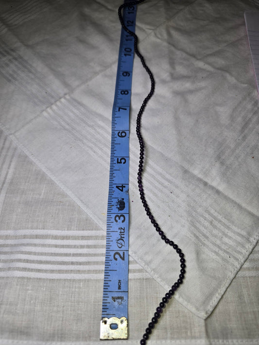 Amethyst round bead strand