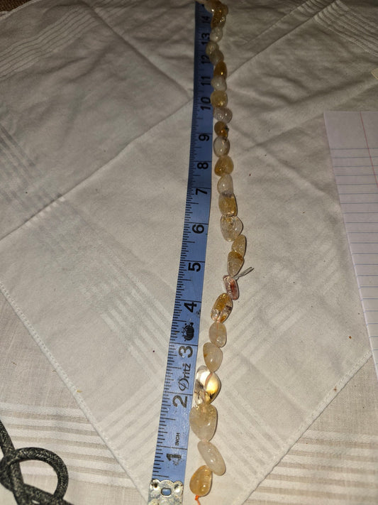 Golden rutilated quartz nugget bead strand