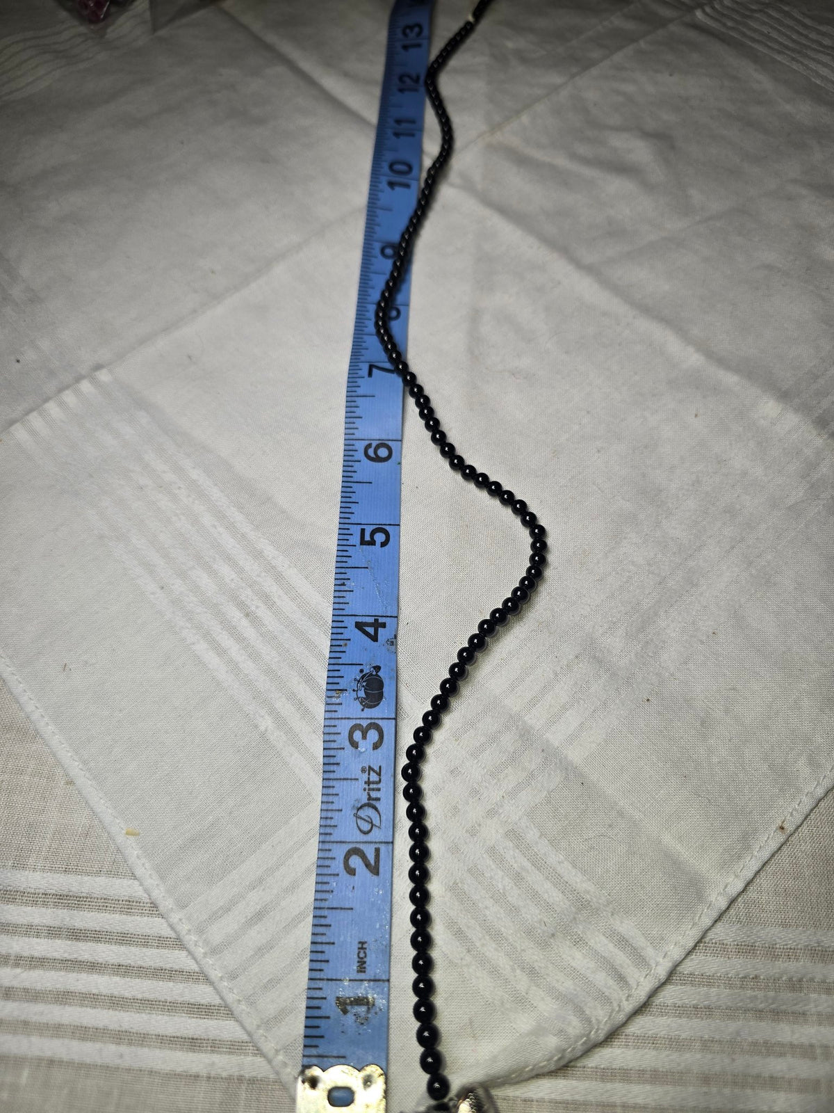 Black round bead strand