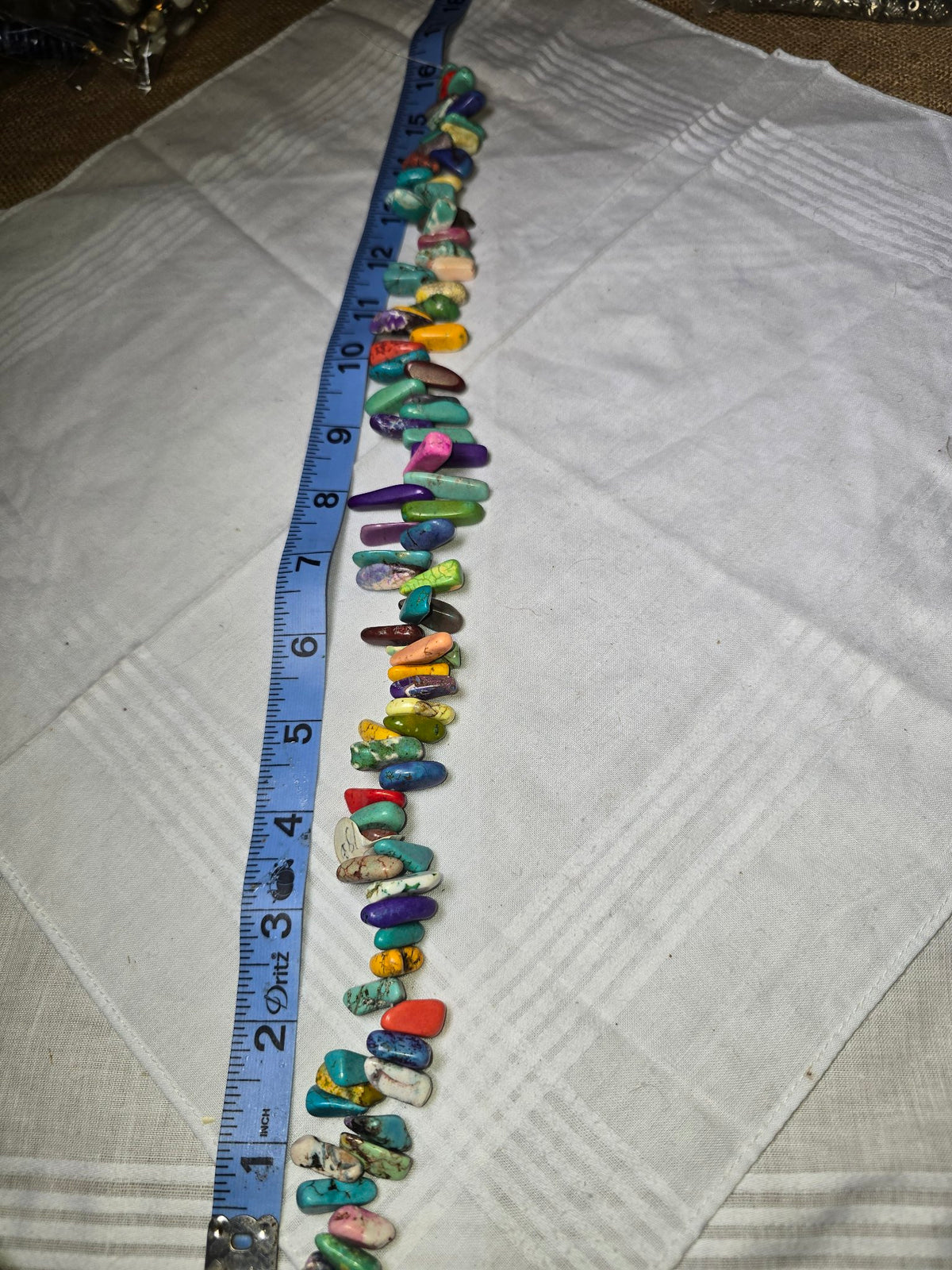 Multicolor dyed howlite stick bead strand