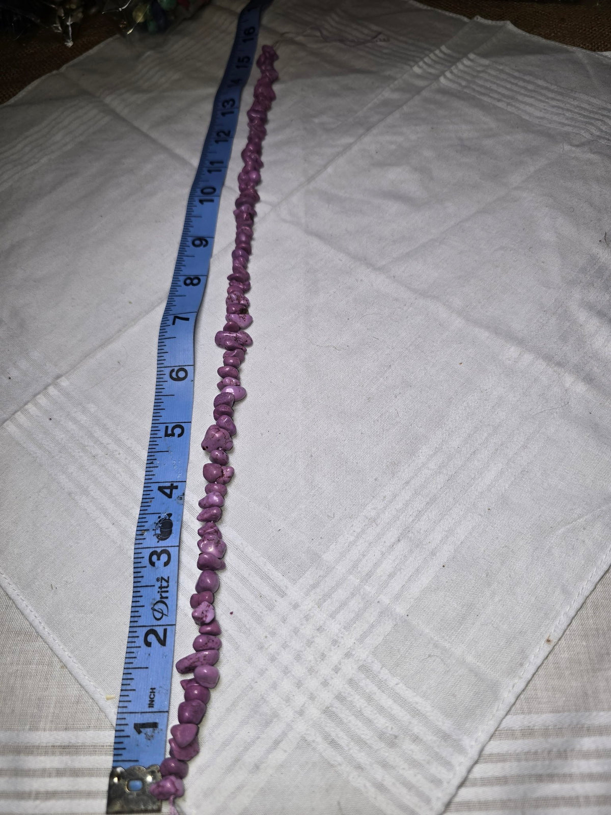 Purple dyed howlite chip bead strand