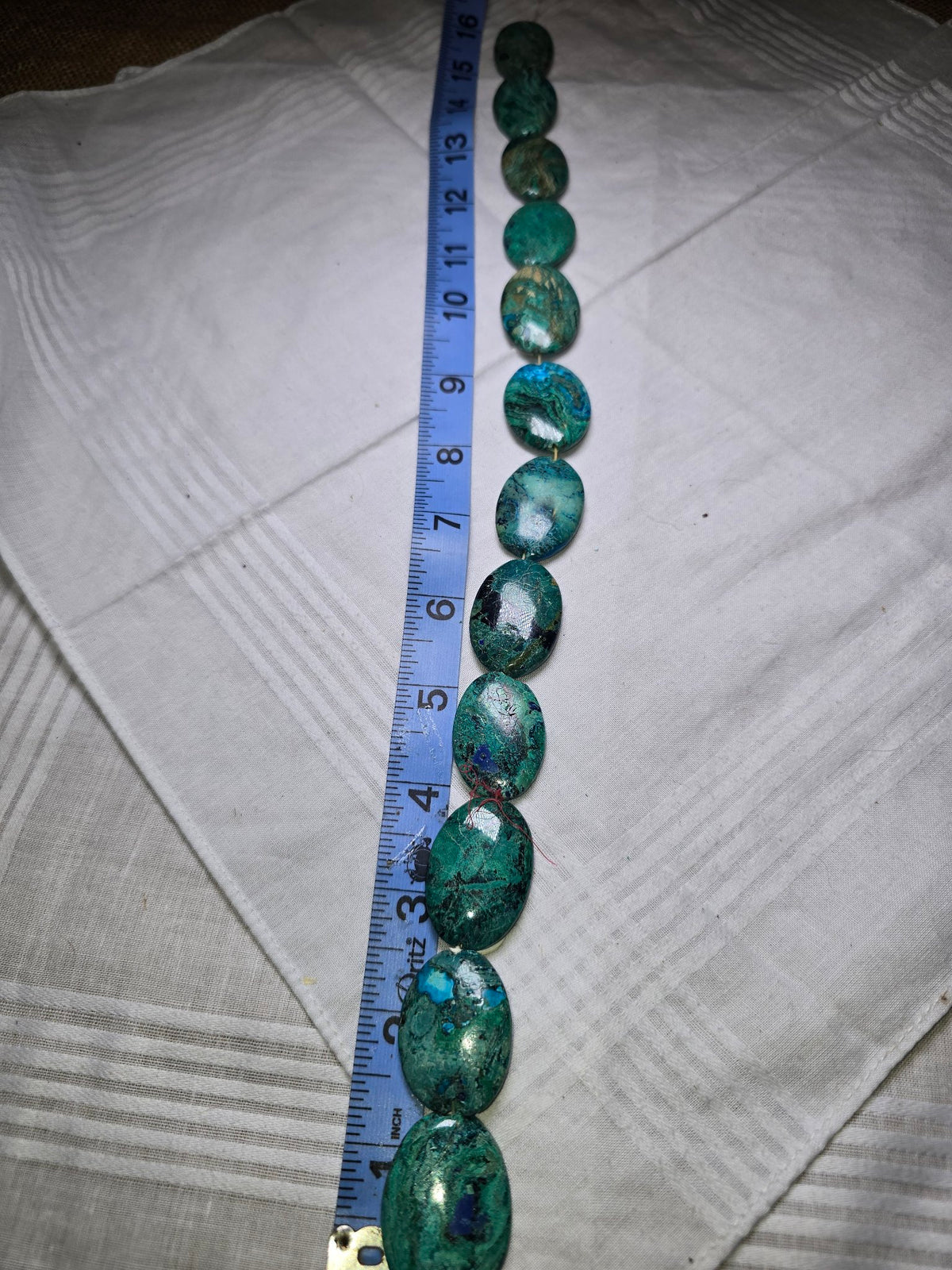 Chrysocolla in lapis flat oval bead strand