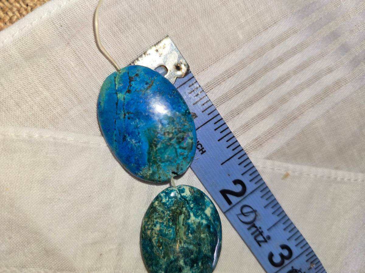 Chrysocolla in lapis large oval closeup