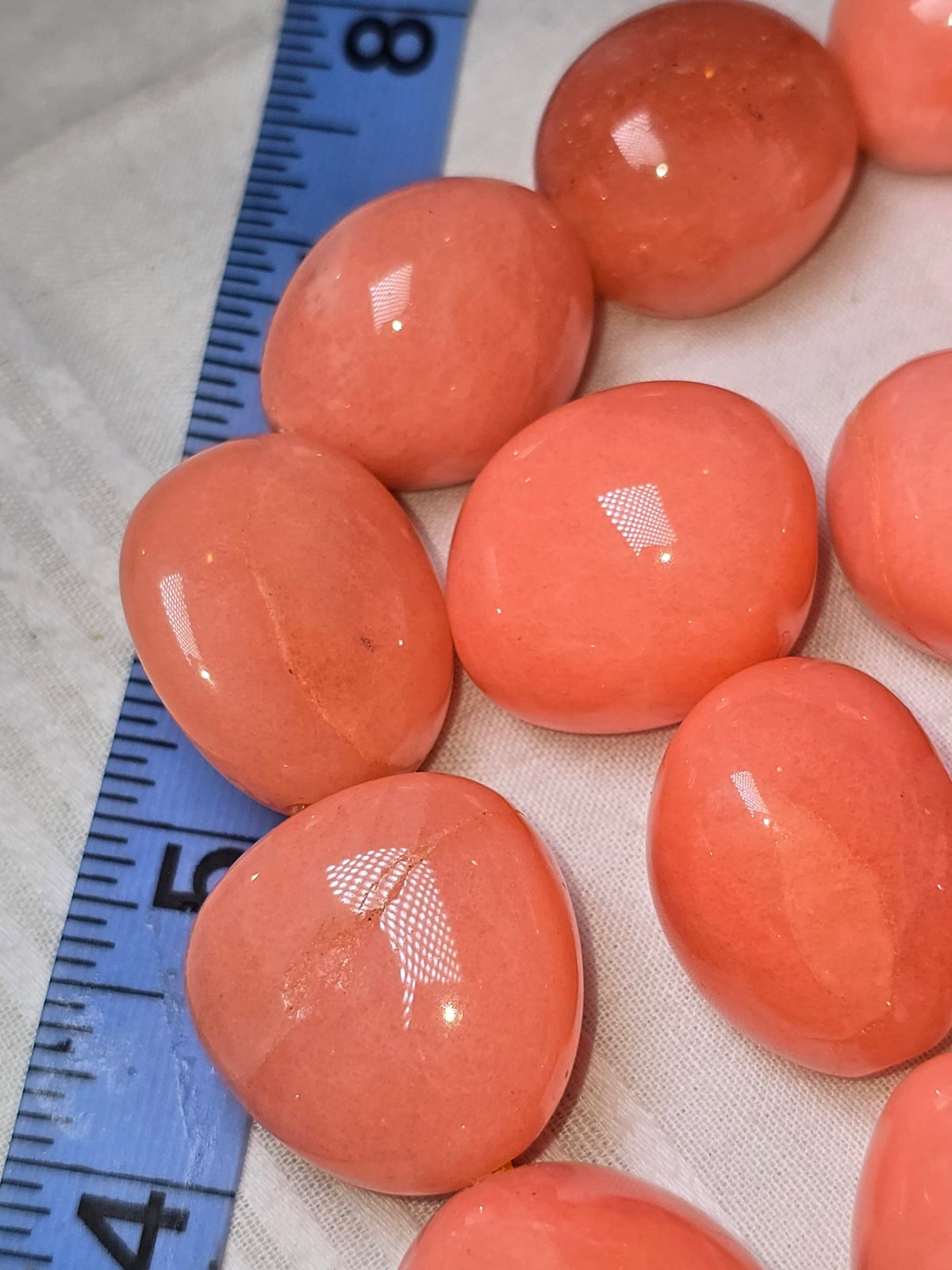 Salmon pink large oval bead closeup