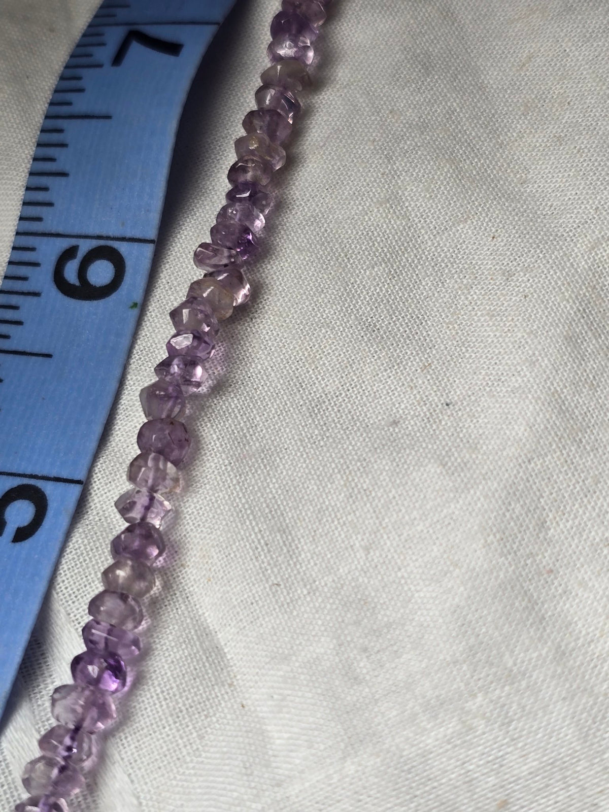 Amethyst chip bead strand closeup