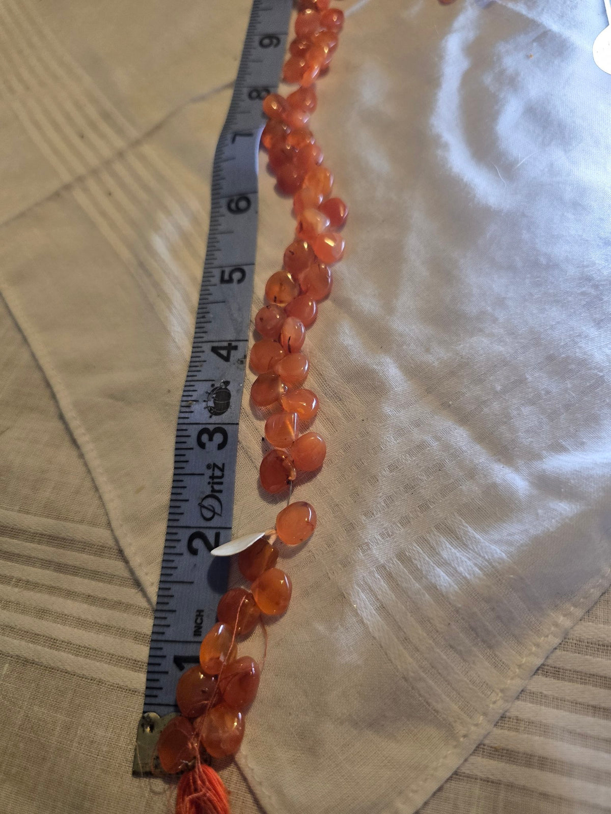 Carnelian flat oval bead strand