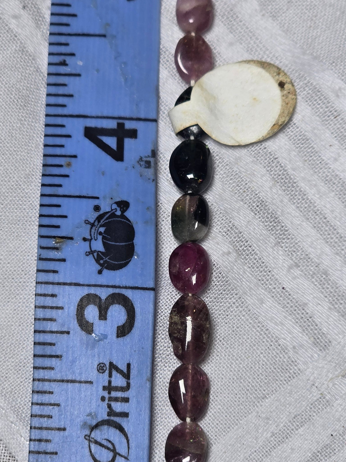 Tourmaline oval bead strand closeup