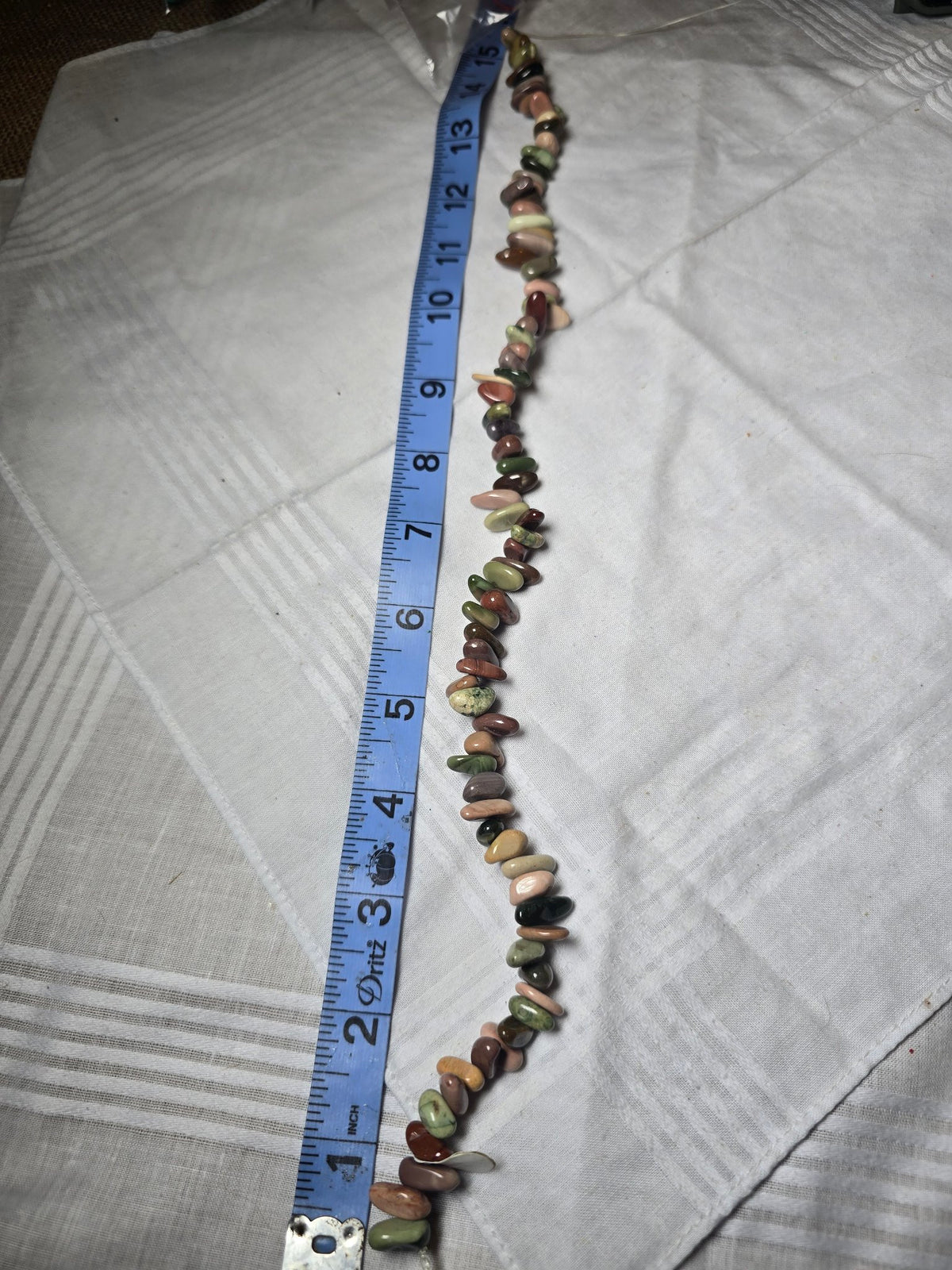 Mixed earth-tone chip bead strand